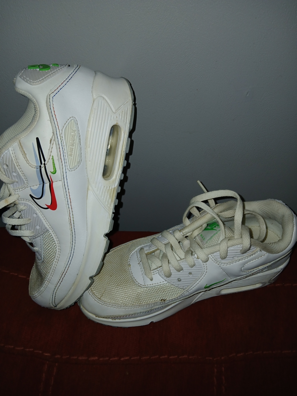 Nike Kids White Sneakers with Red, Blue and Green Swooshes